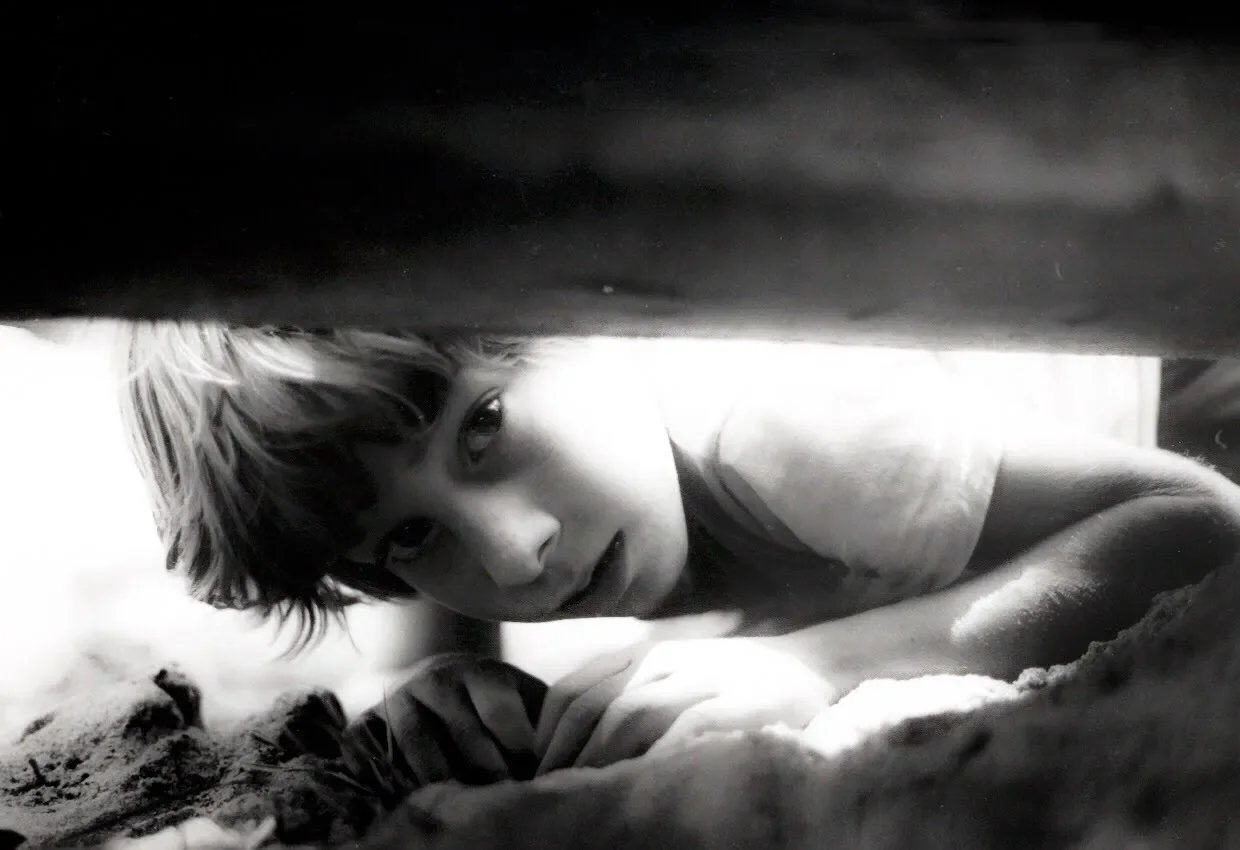 While playing hide and seek, I took this picture of Dylan as he found the place I was hiding.
Olympus-OM-1   Film-Trx400￼